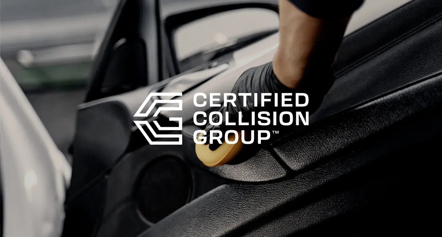 Certified Collision Group logo overlaying a close-up of a gloved technician polishing a car door interior, representing high-quality collision repair standards. Certified Collision Group logo overlaying a close-up of a gloved technician polishing a car door interior, representing high-quality collision repair standards.